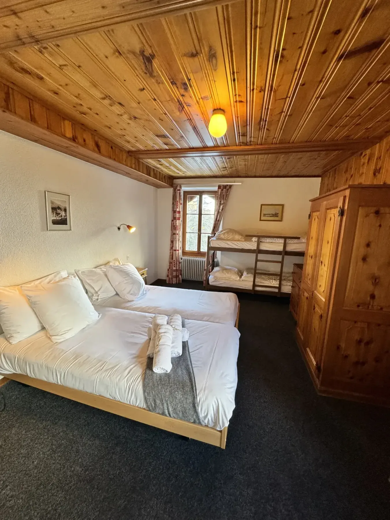 Family room with double bed and bunk beds