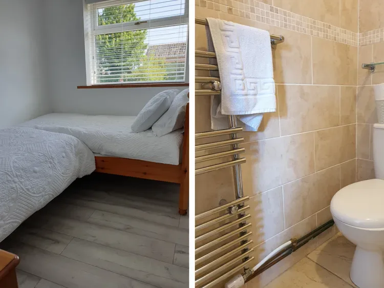 A bedroom with a bed beside a window and a tiled bathroom with a towel rail.