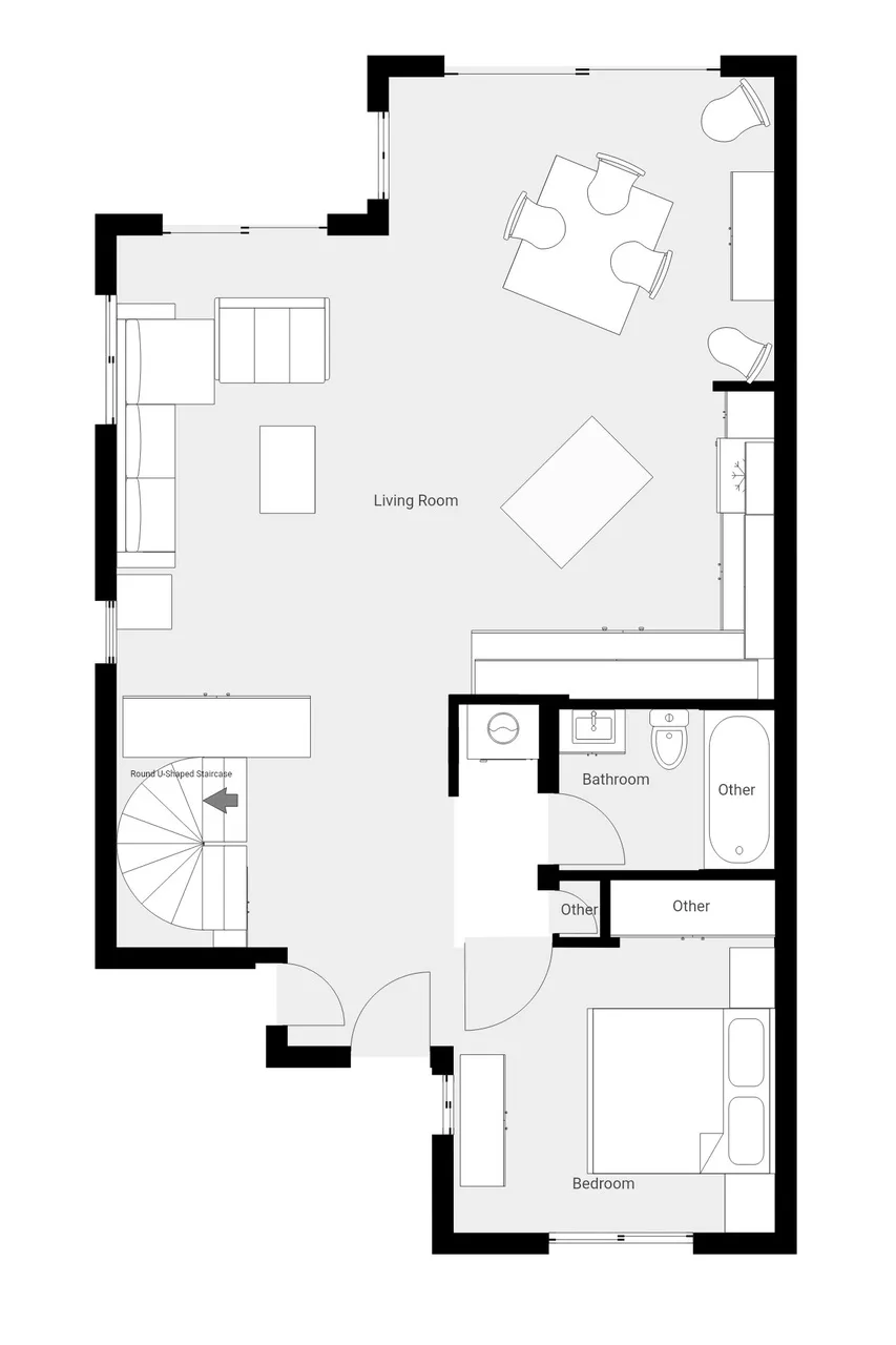 Un plano muestra una sala de estar, un dormitorio, un baño y una escalera.