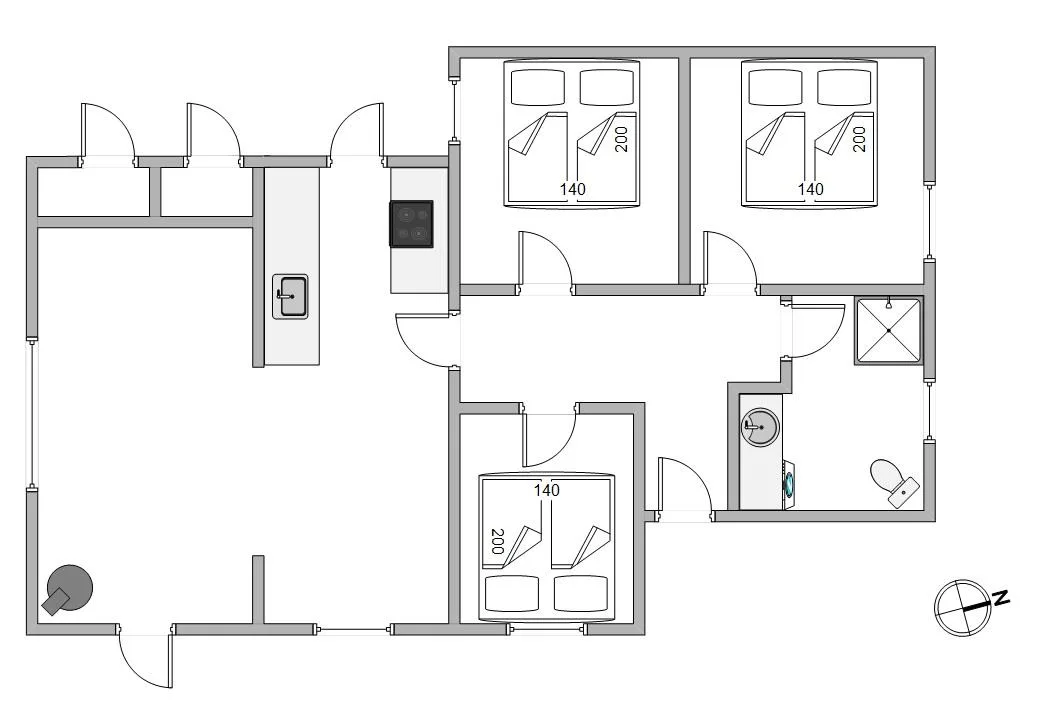 Plano de una casa de vacaciones con tres dormitorios y un baño.
