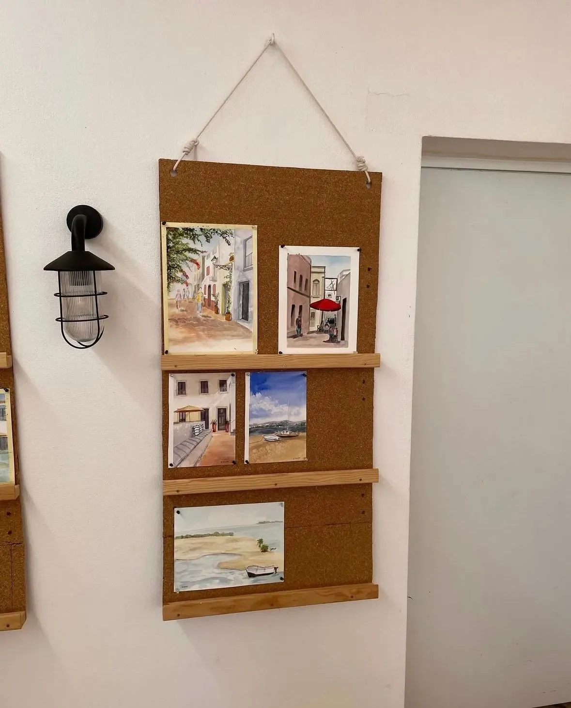 A display board with photographs.