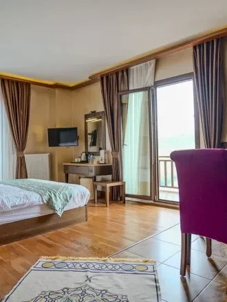 Habitación doble con vistas al lago y cocina
