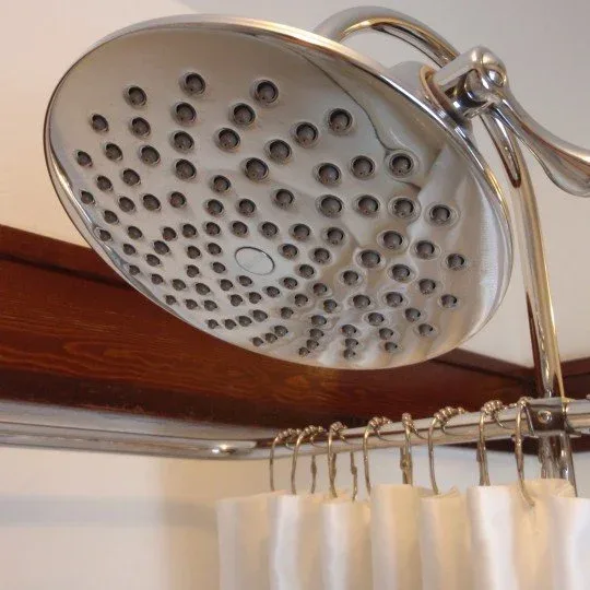 Rain-head shower and claw-foot tub