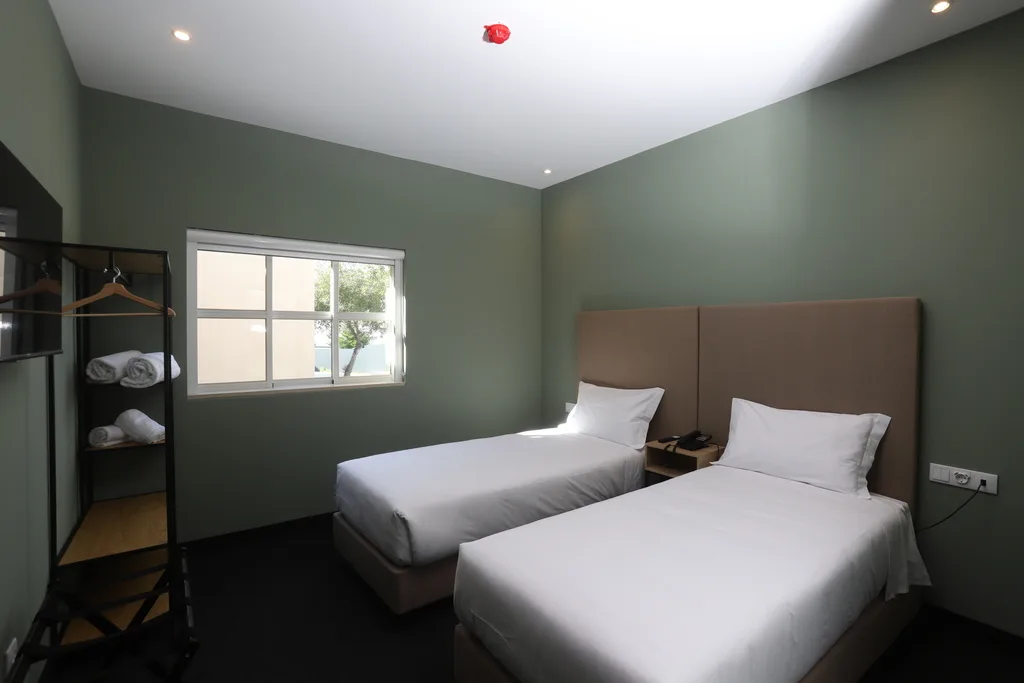 Habitación clásica con dos camas individuales
