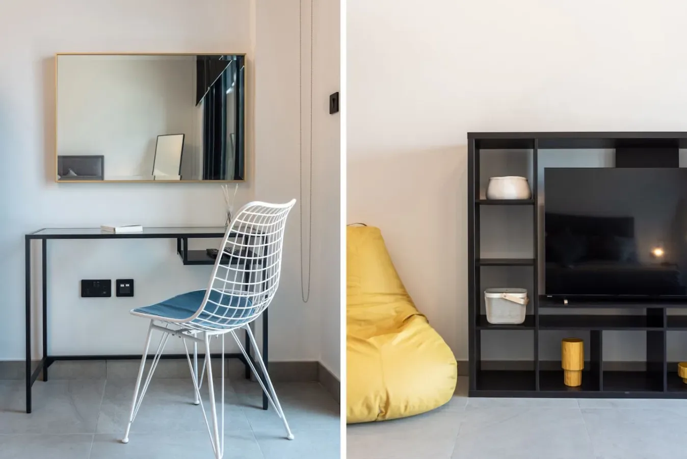 Una pequeña sala de estar con escritorio y silla junto a un mueble para televisión.