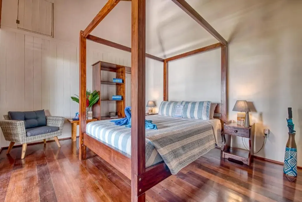 Four-poster bed in the ocean-facing Waves Suite
