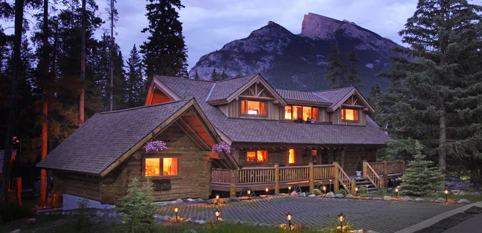 Banff Log Cabin at night