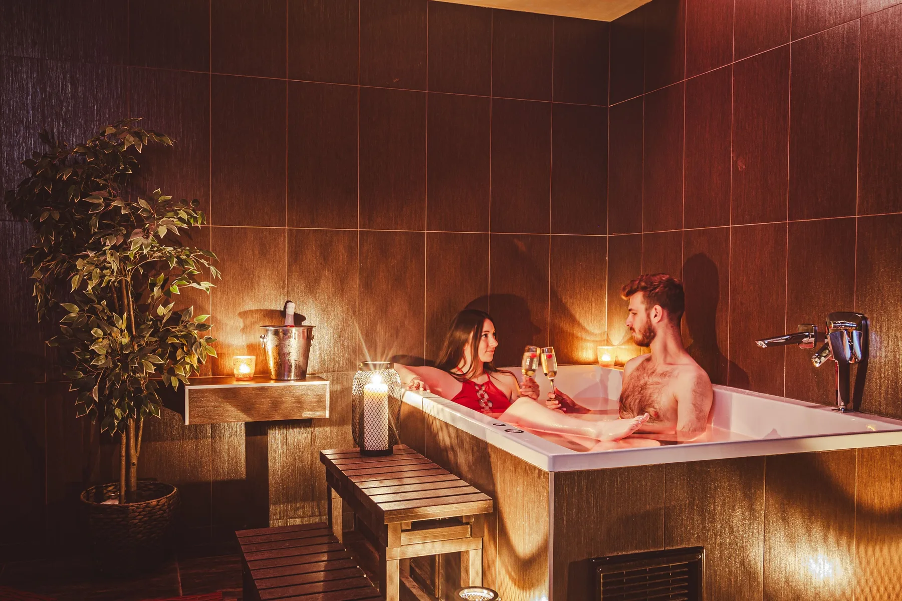 Private hotel relaxation area with a whirlpool.