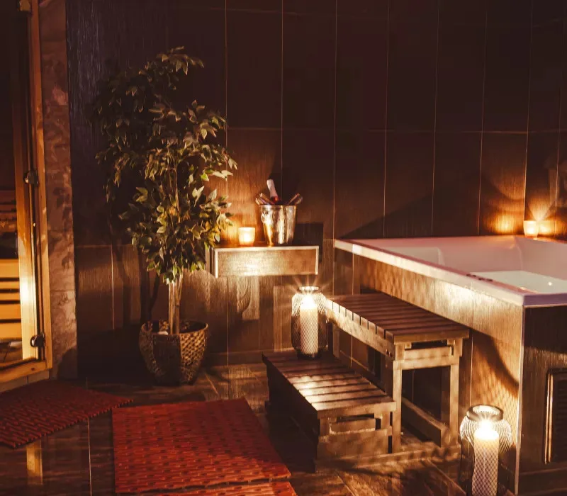 Private wellness area with a whirlpool and Finnish sauna.