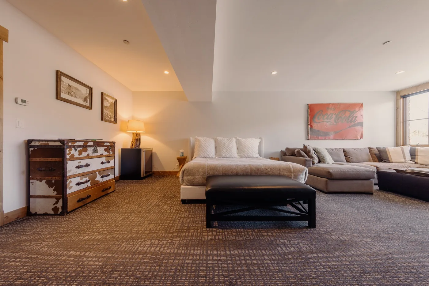 A living room with seating arranged around a low coffee table.