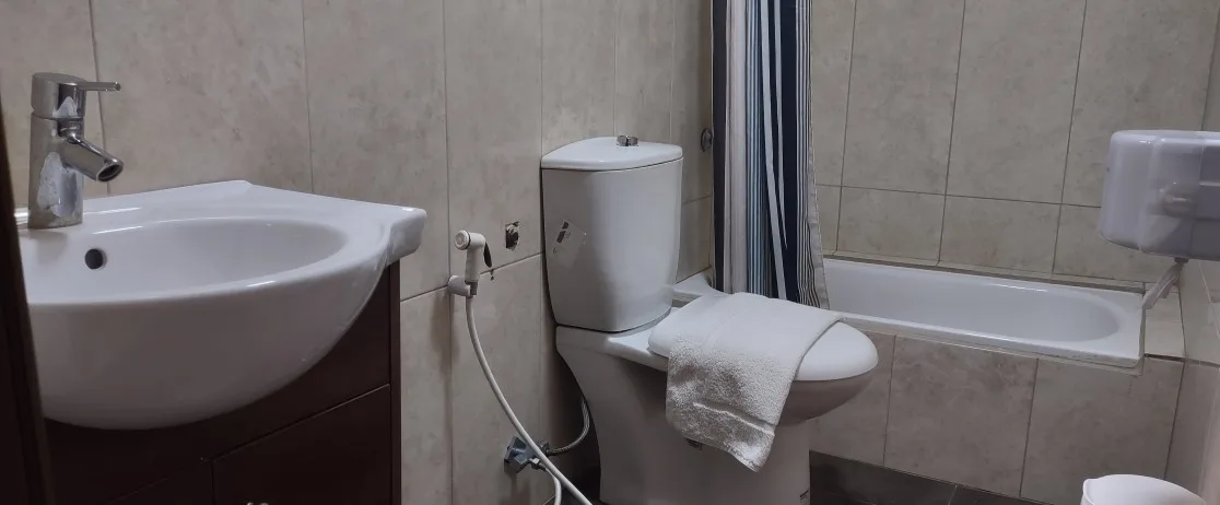 Bathroom with tub and shower