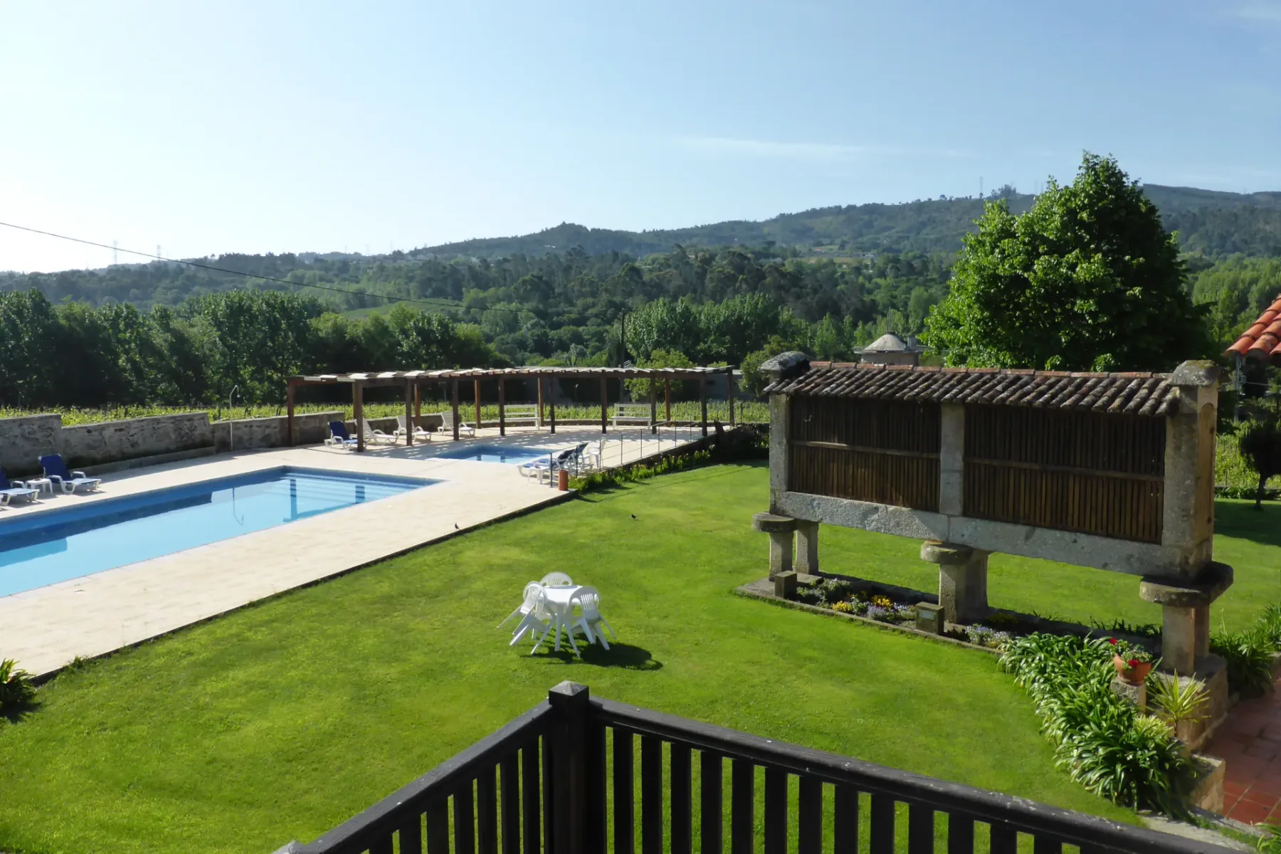 Pool at the Three-Bedroom House with Balcony