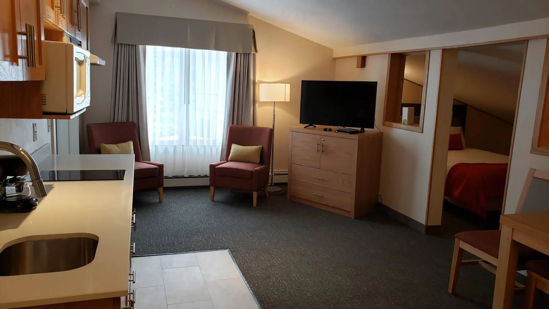 Zona de estar de la suite familiar de 1 dormitorio