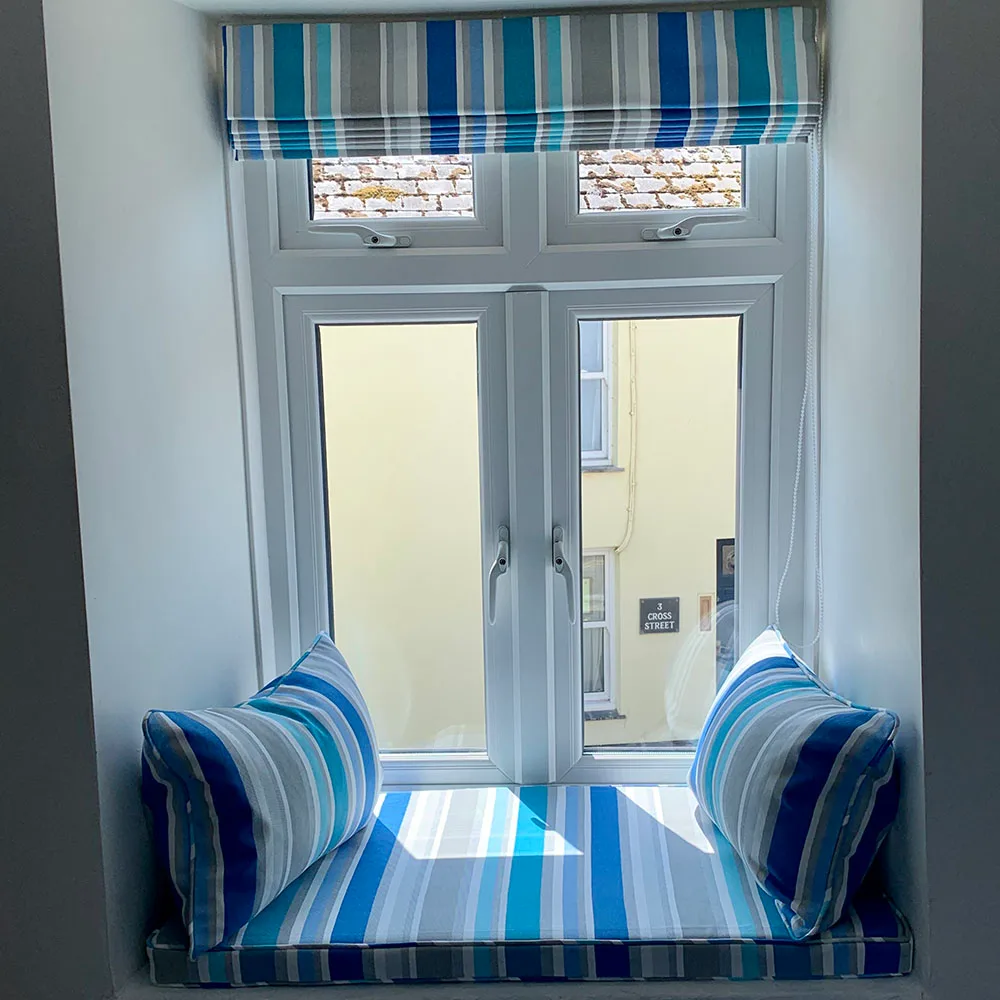 Blue striped window seat in the Samphire twin room
