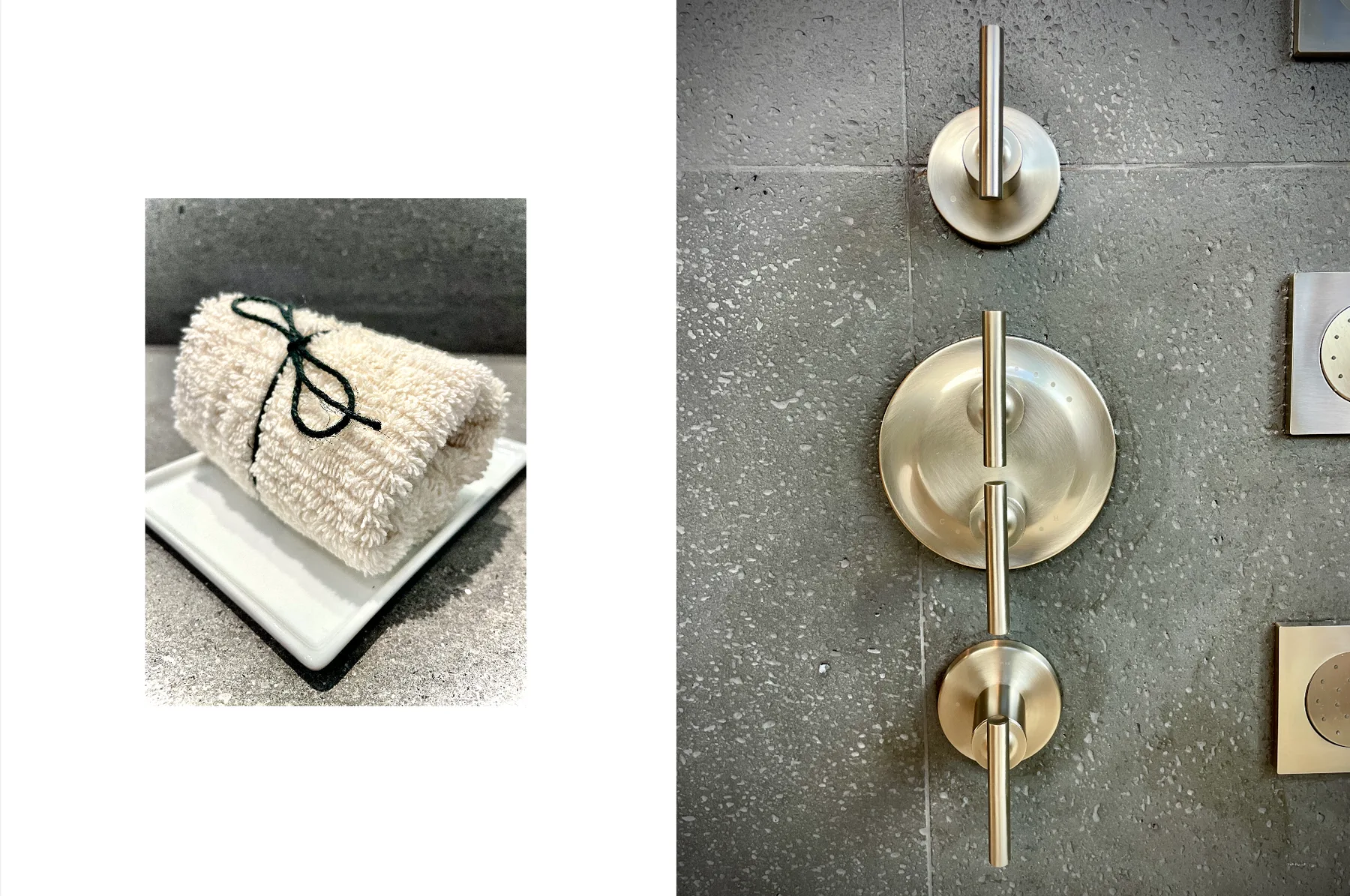A bathroom counter displays a folded towel beside a brass shower control.