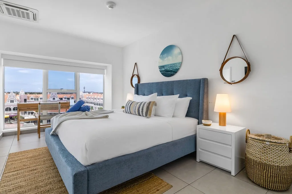 Sink into plush comfort with crisp linens and soft pillows. Your peaceful retreat features calming coastal décor and thoughtful touches to help you unwind completely.