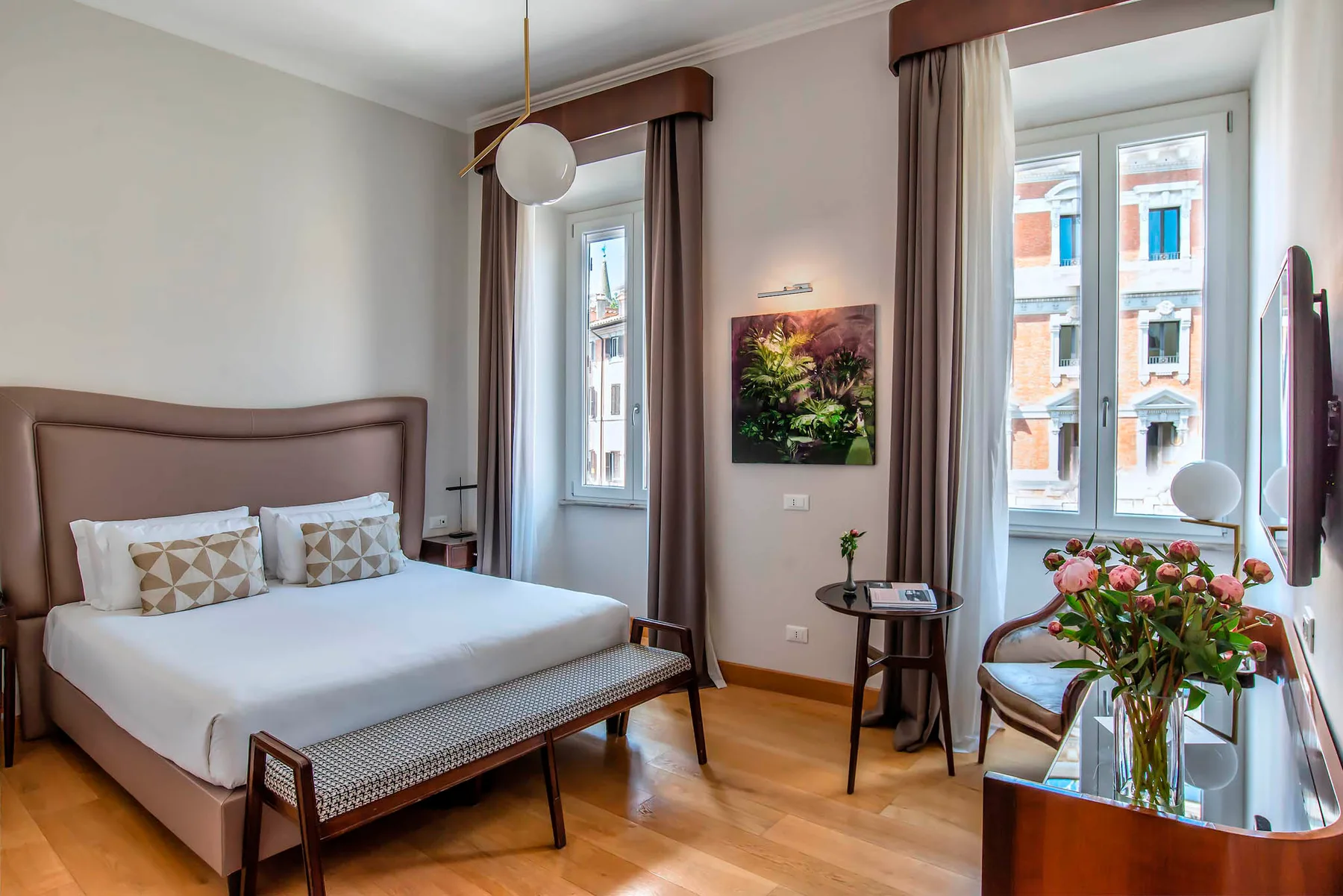 Bedroom with bed and chairs