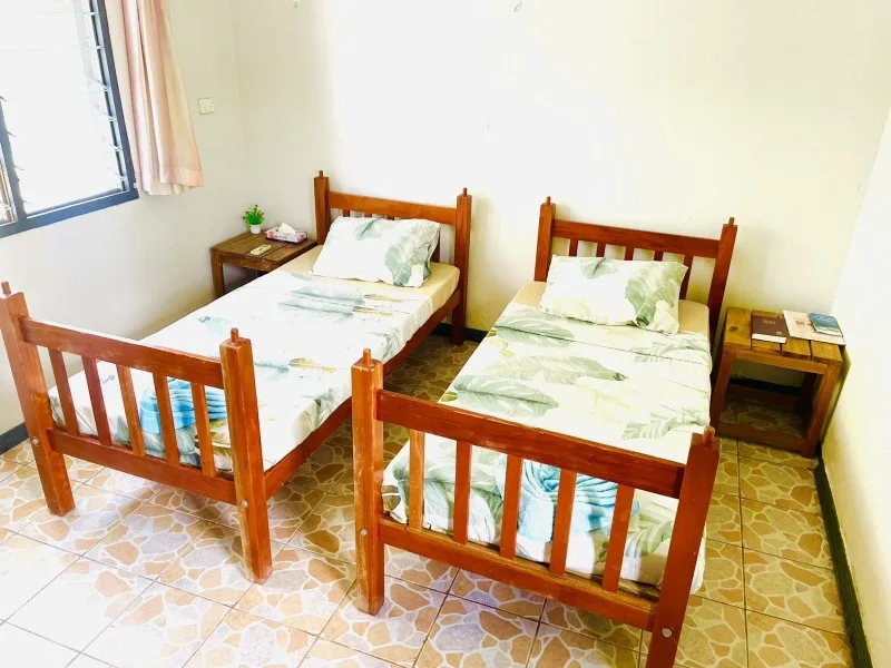 Camas en dormitorio compartido