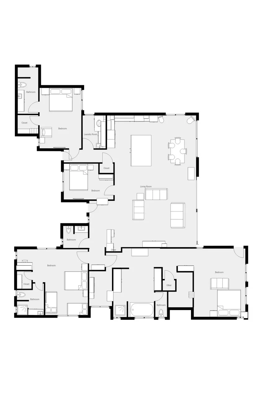 Un plano residencial muestra varias habitaciones dispuestas alrededor de una zona central de estar.