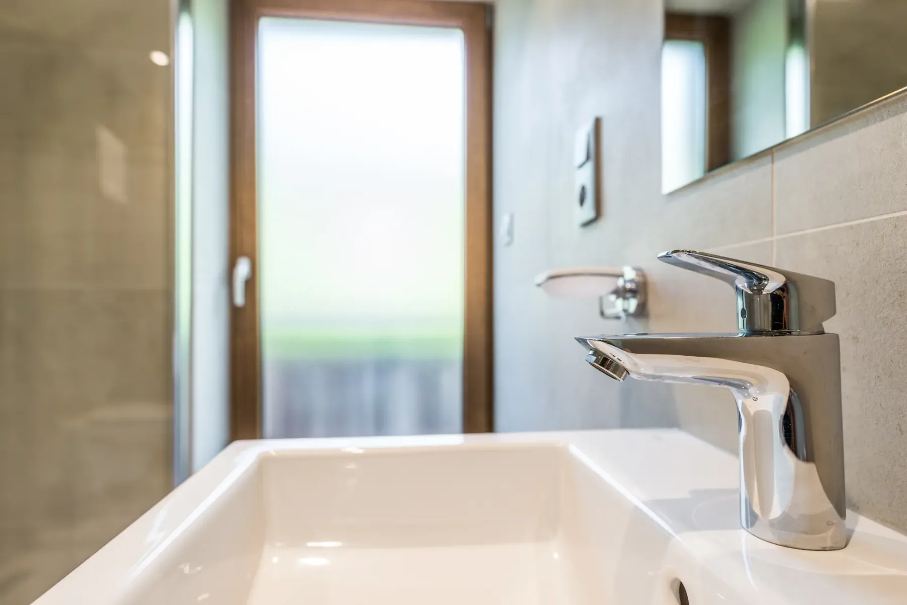 Modern bathroom walk-in shower family apartment Kauri Morzine