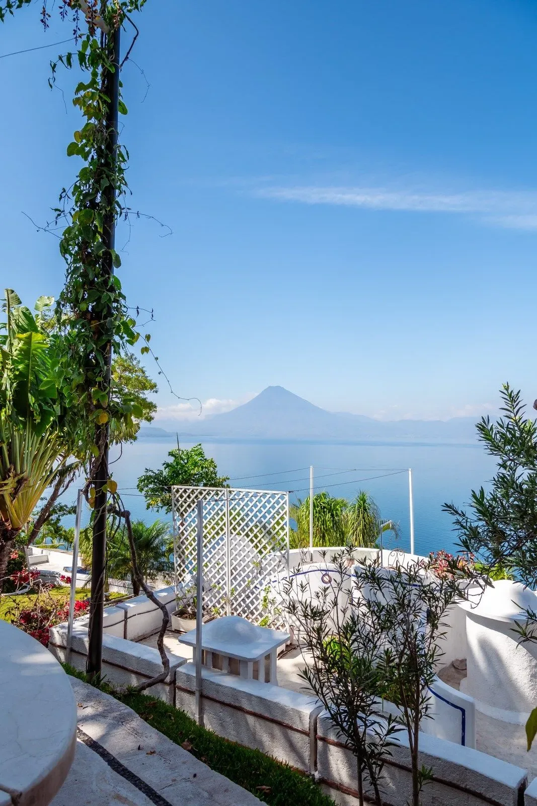 View from a balcony with a mountain in the background.