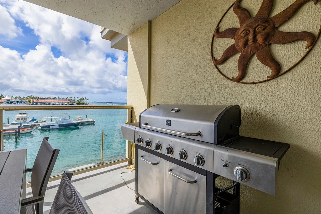 Grill your favorite meals on your private balcony, where turquoise waters and tropical breezes set the scene for unforgettable waterfront dining moments.