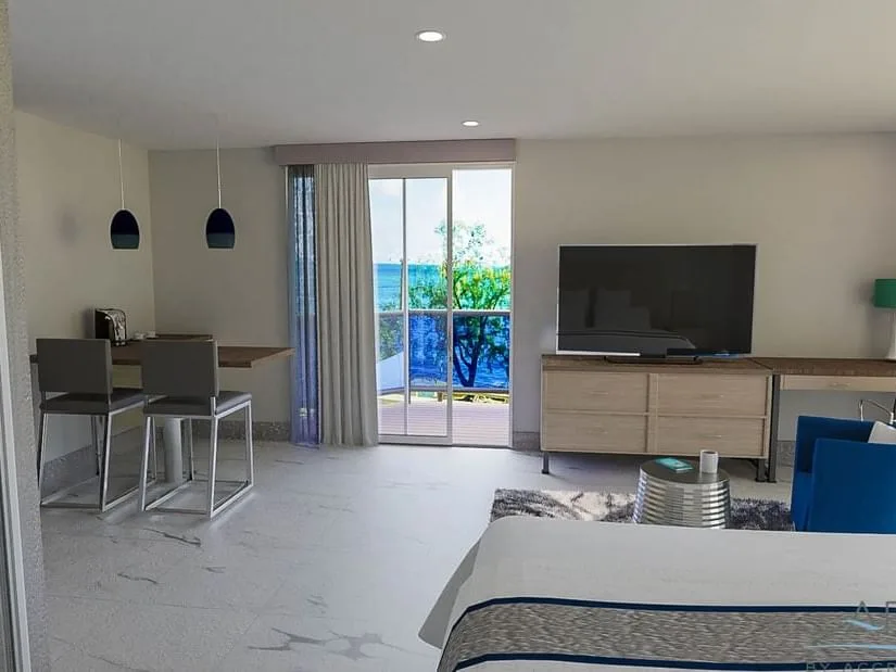 Habitación Ocean Front Grand con balcón y zona de comedor