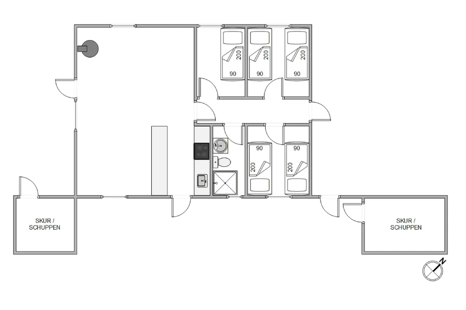Plano de planta con varias zonas para dormir, baños compartidos y dos cocinas.