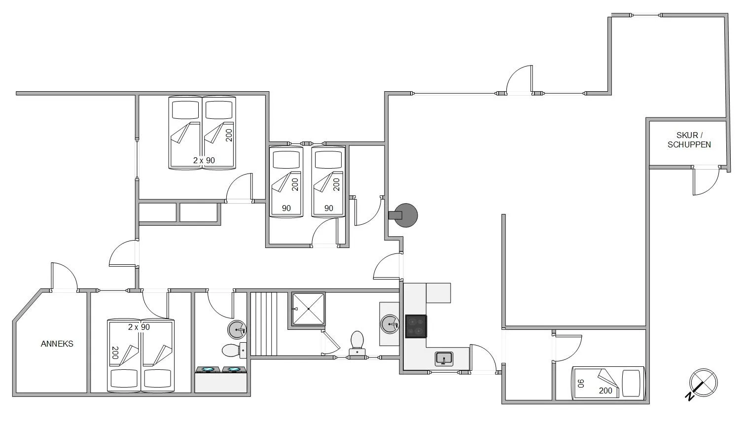 El plano de una casa muestra dormitorios, baños y una amplia zona de estar.