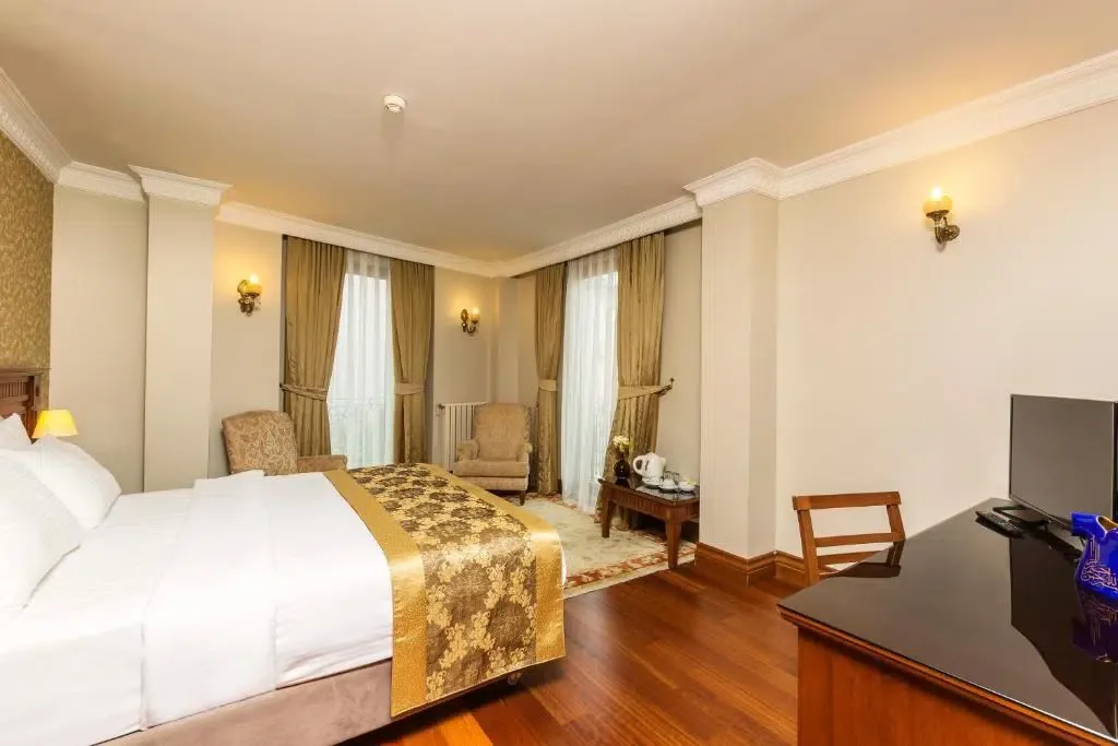 Foto de una habitación del Acra Hotel