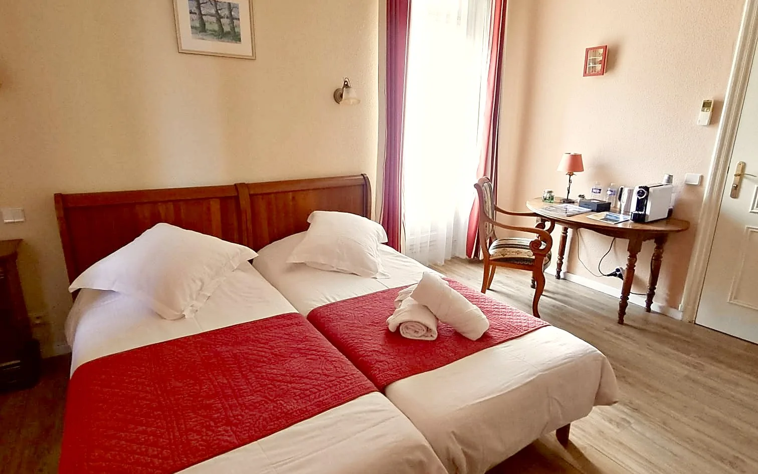 Guest room with a double bed and fireplace