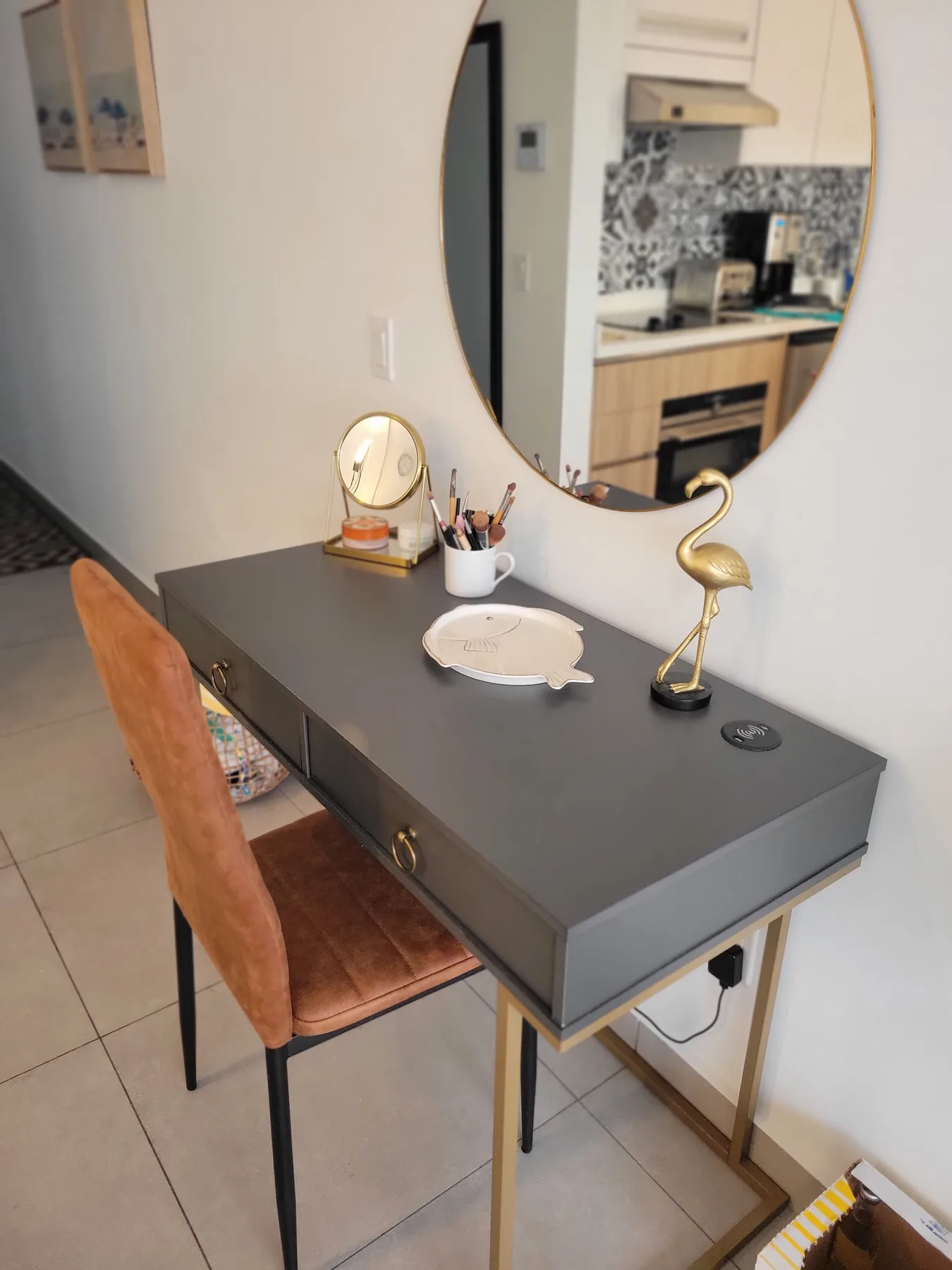 Your stylish bathroom offers a modern vanity with elegant fixtures, a large mirror, and thoughtful touches that make your morning routine a breeze.