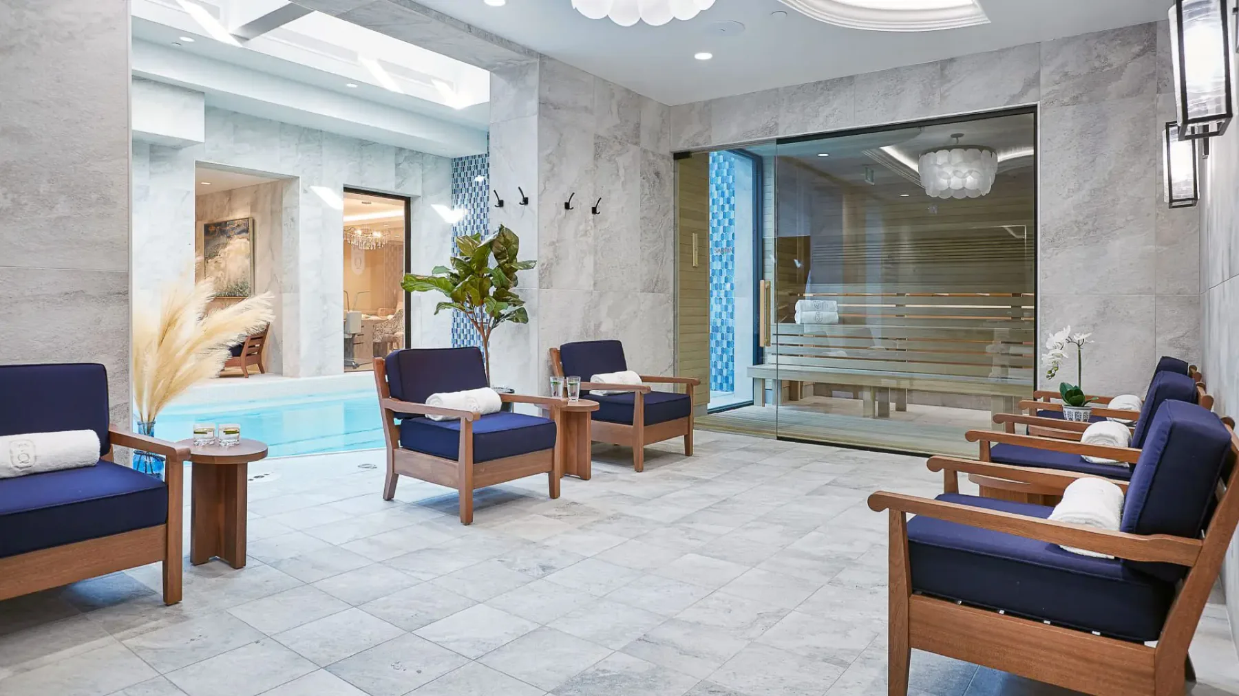 Spa lounge with seating and a hydrotherapy area.