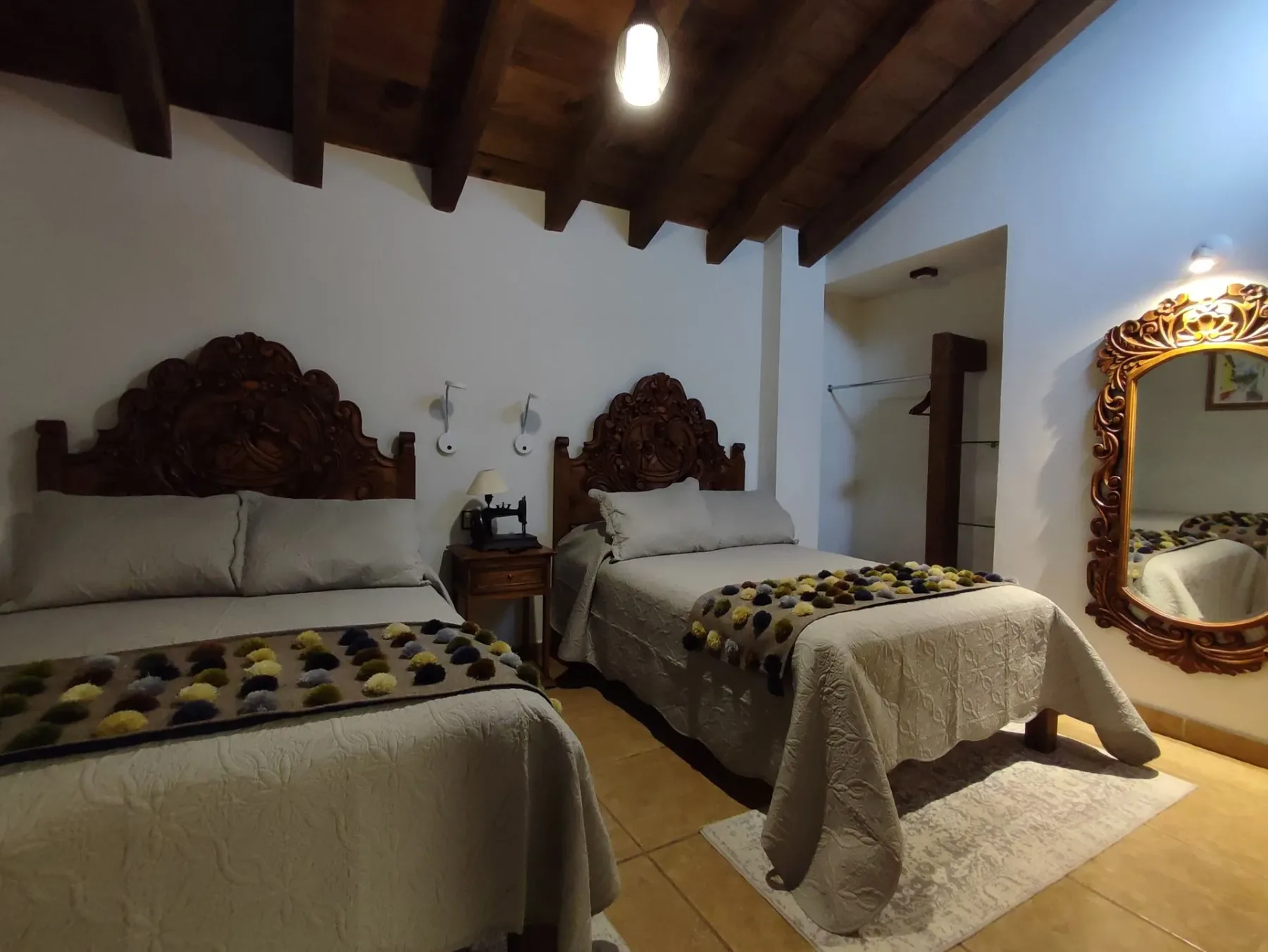 Family apartment bedroom with double beds