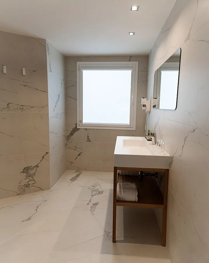 Hotel bathroom with marble finishes.