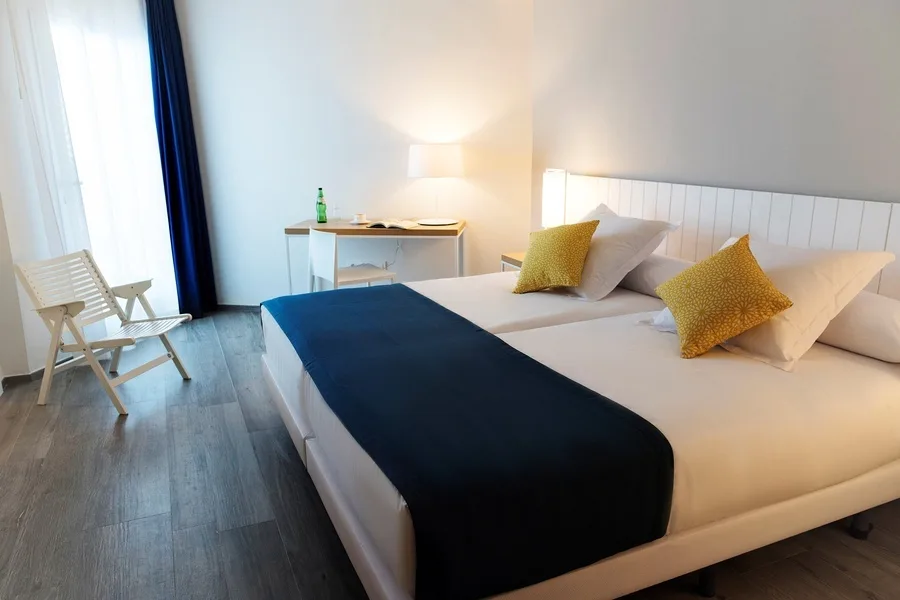 Hotel room with twin beds.