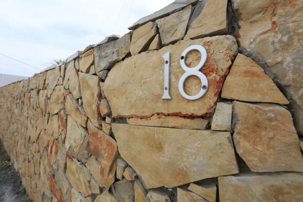 Property entrance wall showing number 18