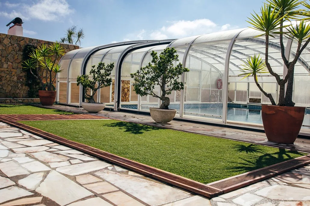 Pool enclosure and outdoor lawn