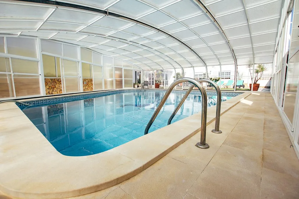 Indoor heated pool with access steps