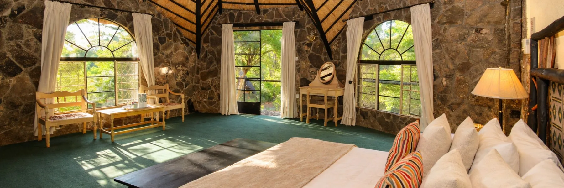 Chalet interior looking out onto granite boulders