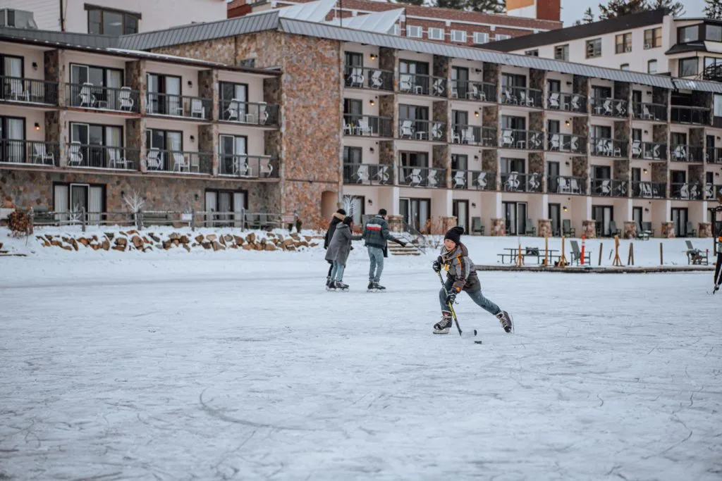 Guests skating on frozen Mirror Lake