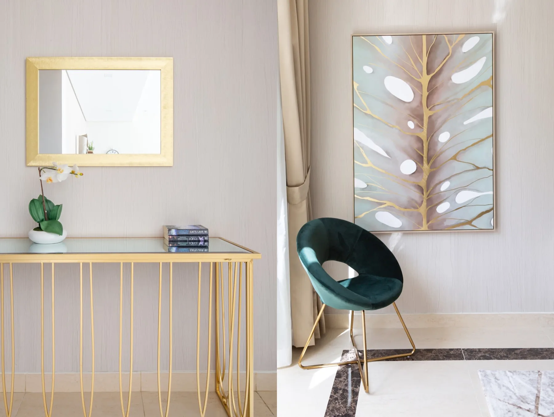 A bright sitting area with a teal chair, console table, and framed artwork.