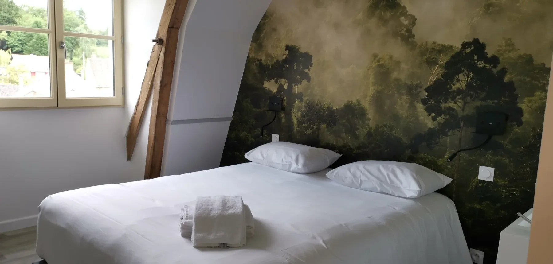 Bedroom with a wall mural