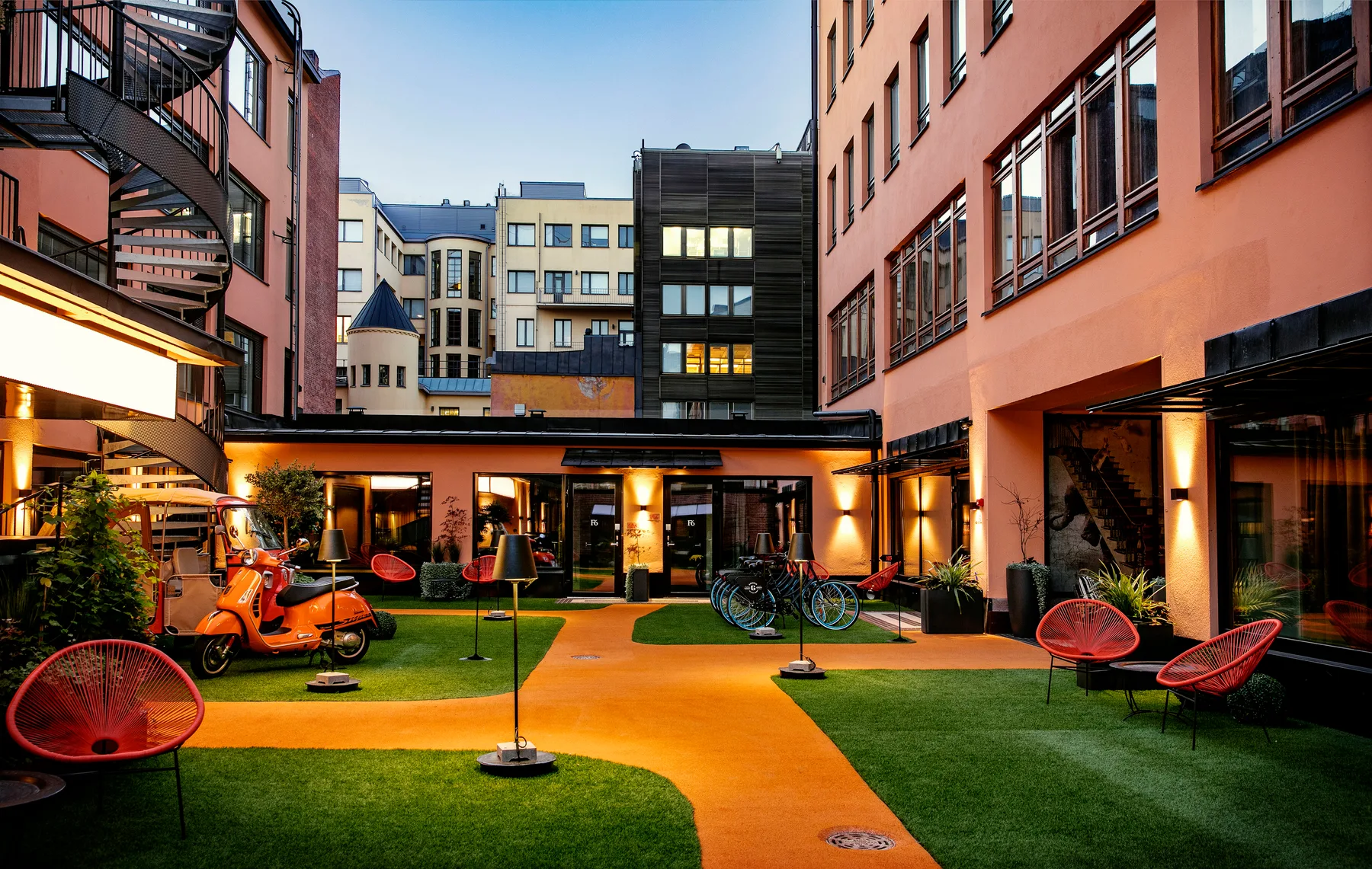 Hotel F6 exterior at dusk.