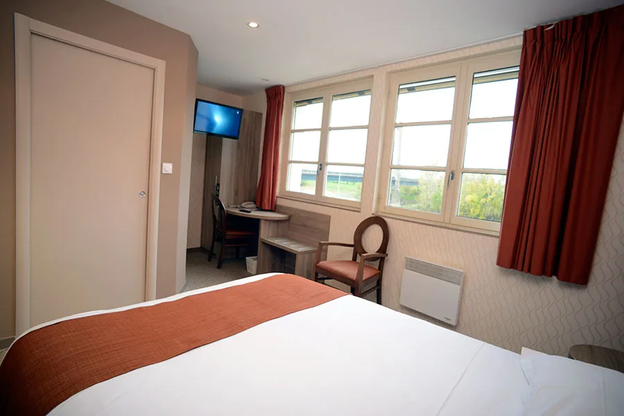 Guest room with bed and television