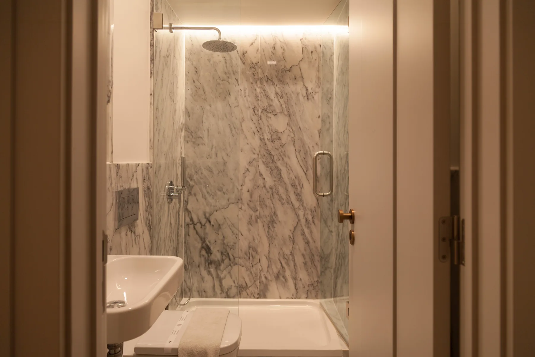 Bathroom with a shower, bathtub, toilet, and sink.