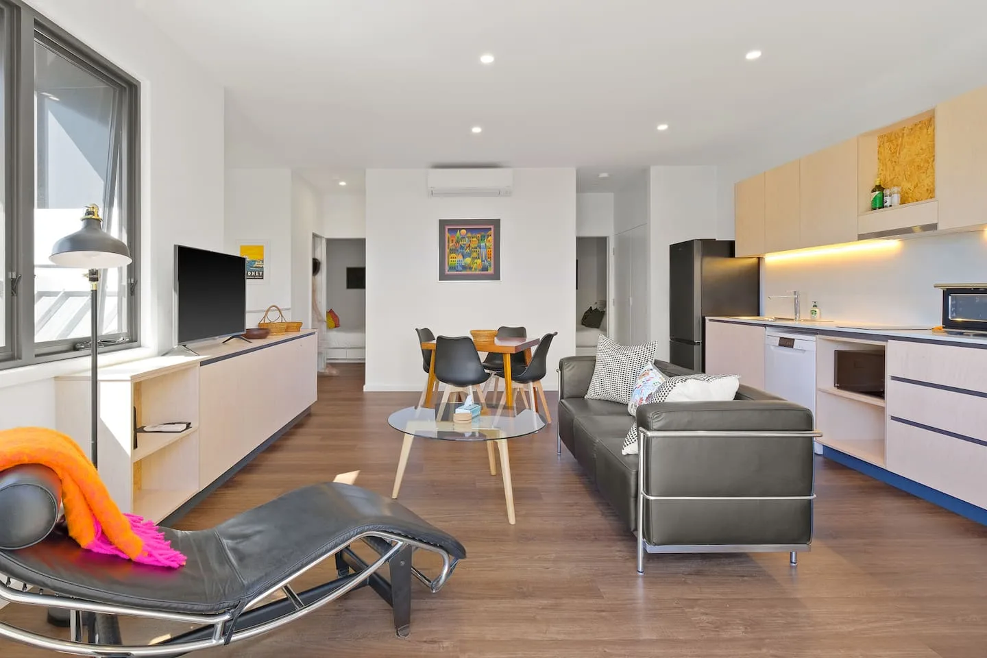 A modern living room with a sofa and a low table.