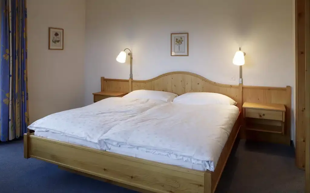 Foto de una habitación del Hotel Alpina Parpan