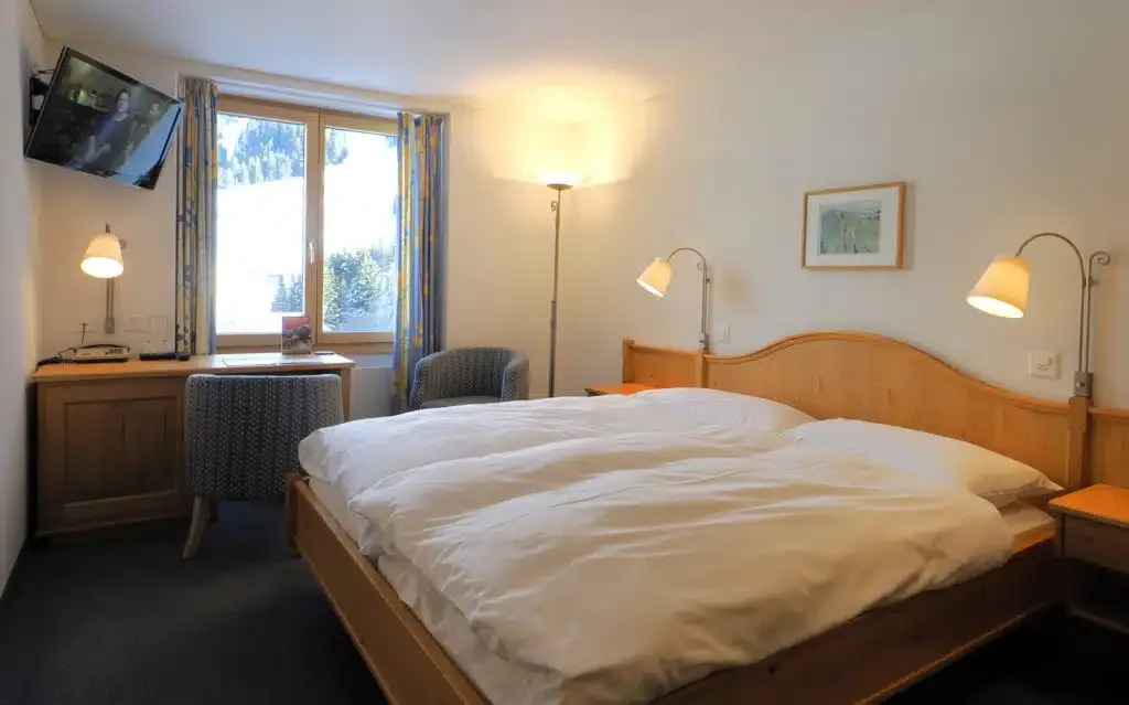 Foto de una habitación del Hotel Alpina Parpan