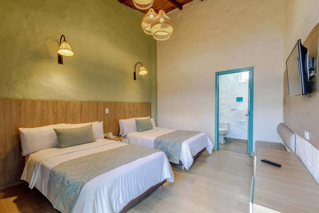 Habitación Confort con dos camas.